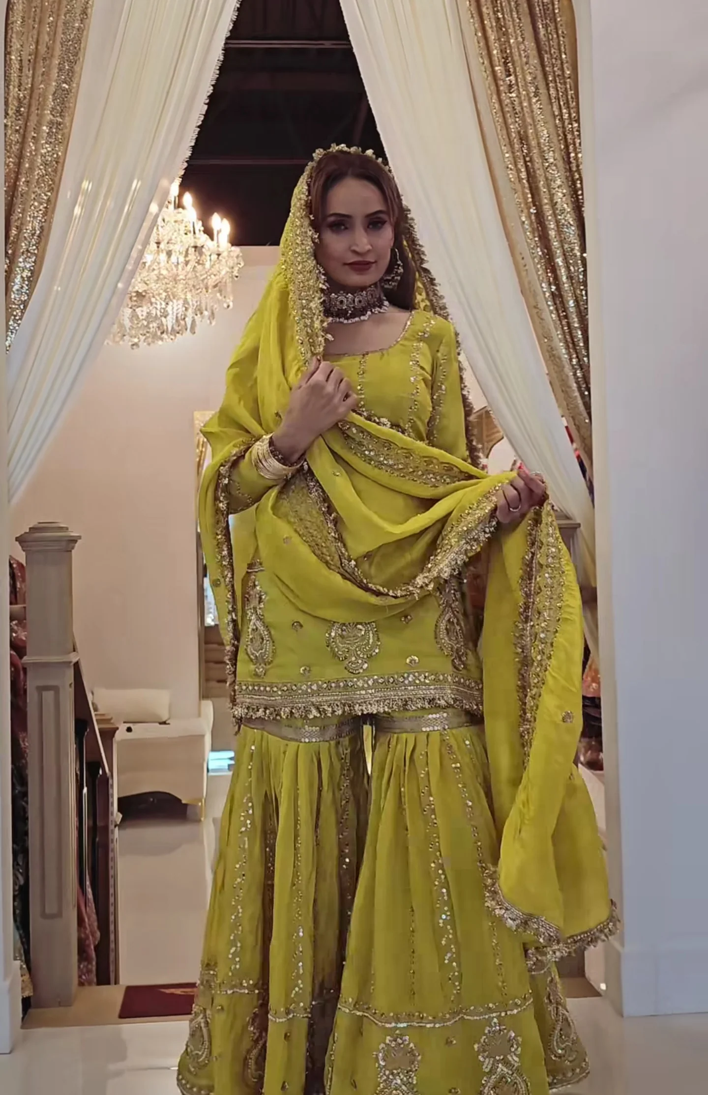 Perfect for festive occasions, this elegant yellow sharara suit features heavy golden embroidery. - Image 5